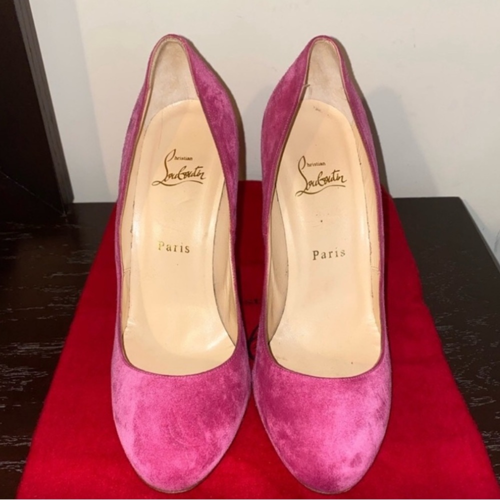 Christian Loubuitton So Kate pink suede pumps.